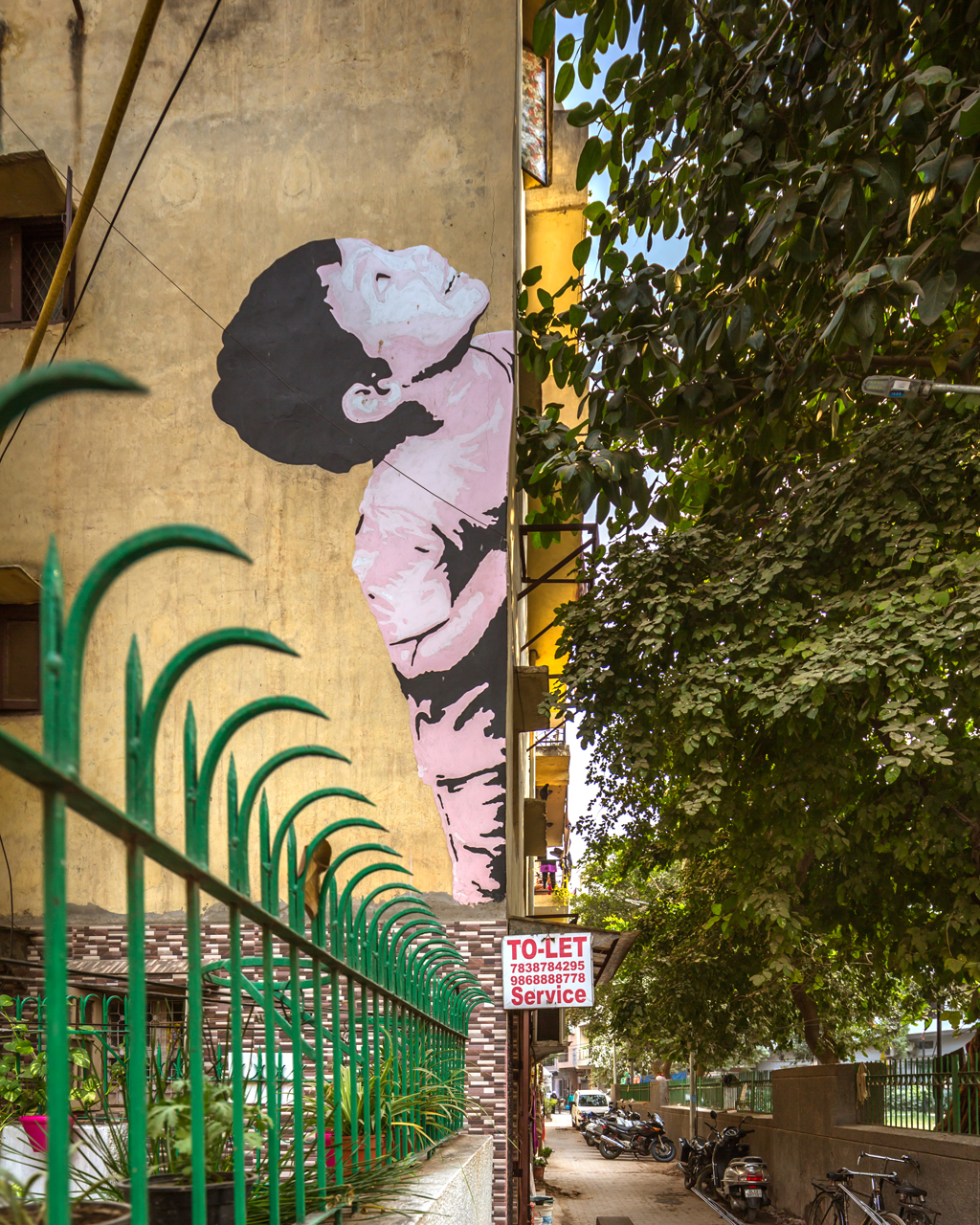 A village boy cheerfully looks up - The City Is Their Canvas