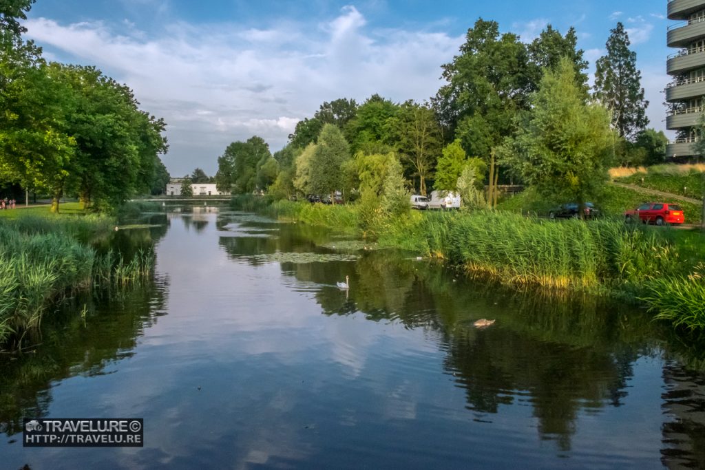 A scenic Canal of Amsterdam Netherlands - Travelure ©