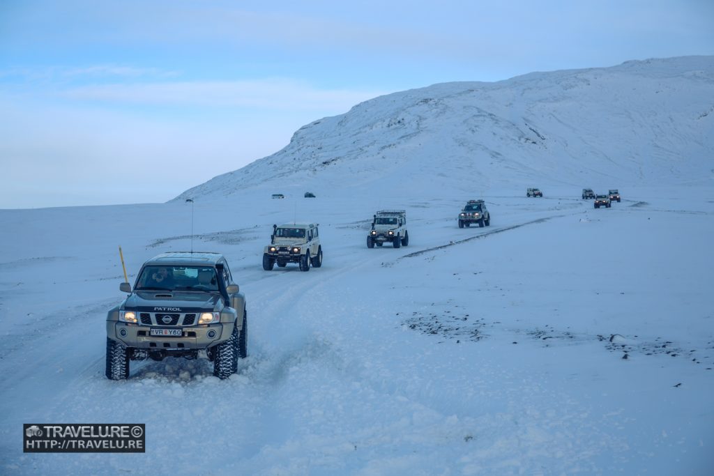 A super jeeps convoy snaking through the Long Glacier Langjökull Iceland - Travelure ©