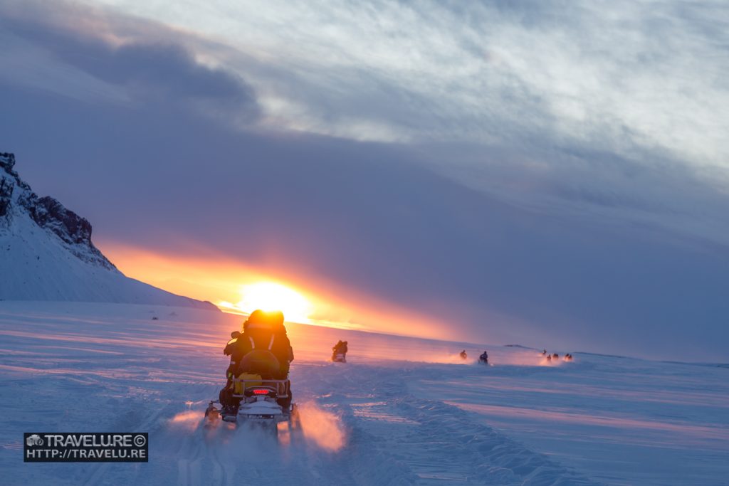 Our convoy of snowmobiles zipping across Long Glacier Langjökull Iceland - Travelure ©