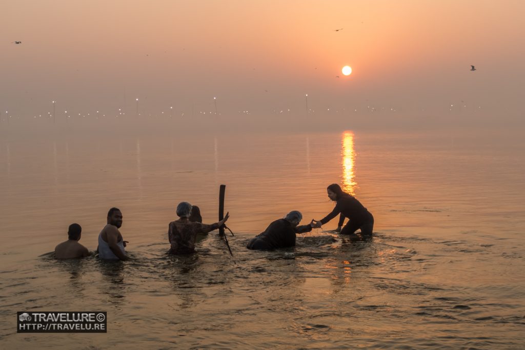 Times Passion Trail participants having a holy dip at Kumbh