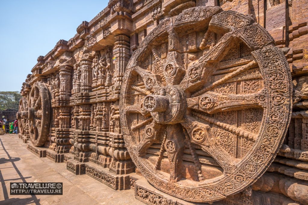 Elaborately carved chariot wheels at Sun Temple