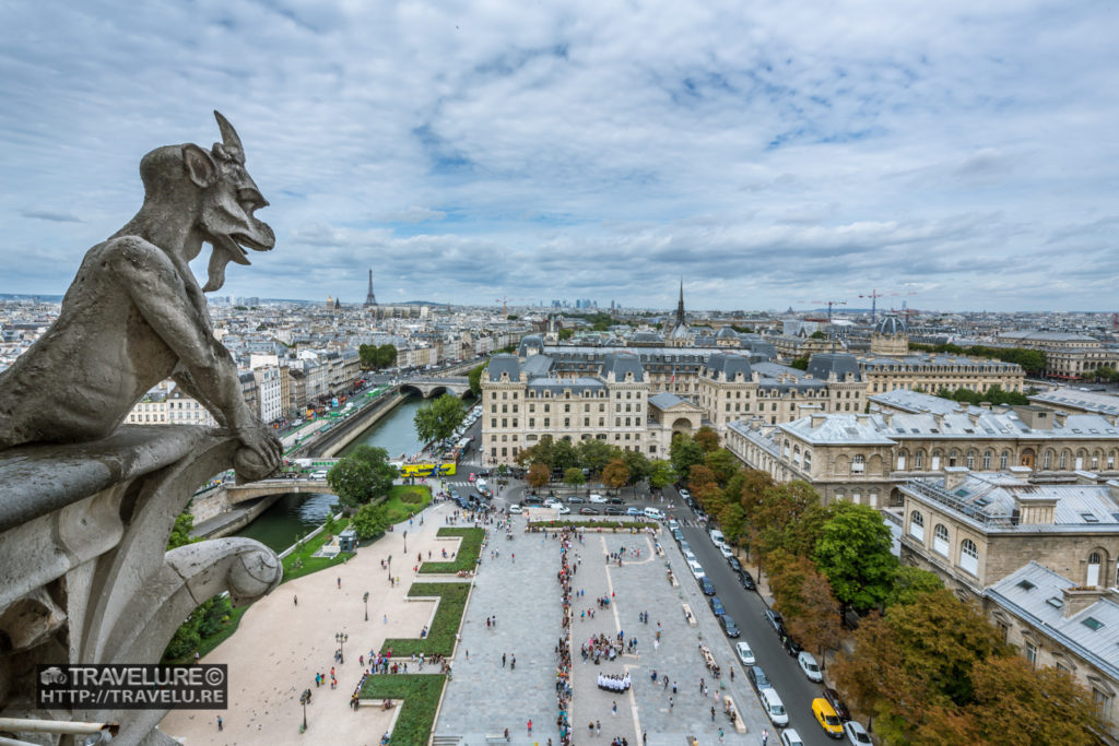 Chimera on Notre-Dame rooftop seems to be watching over Paris - Travelure ©