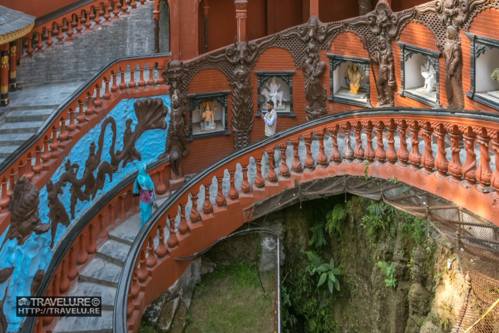 Statues of deities lining up the steps going down to Gupteshwar Mahadev cave. Pokhara - The Jewel of Nepal - Travelure ©