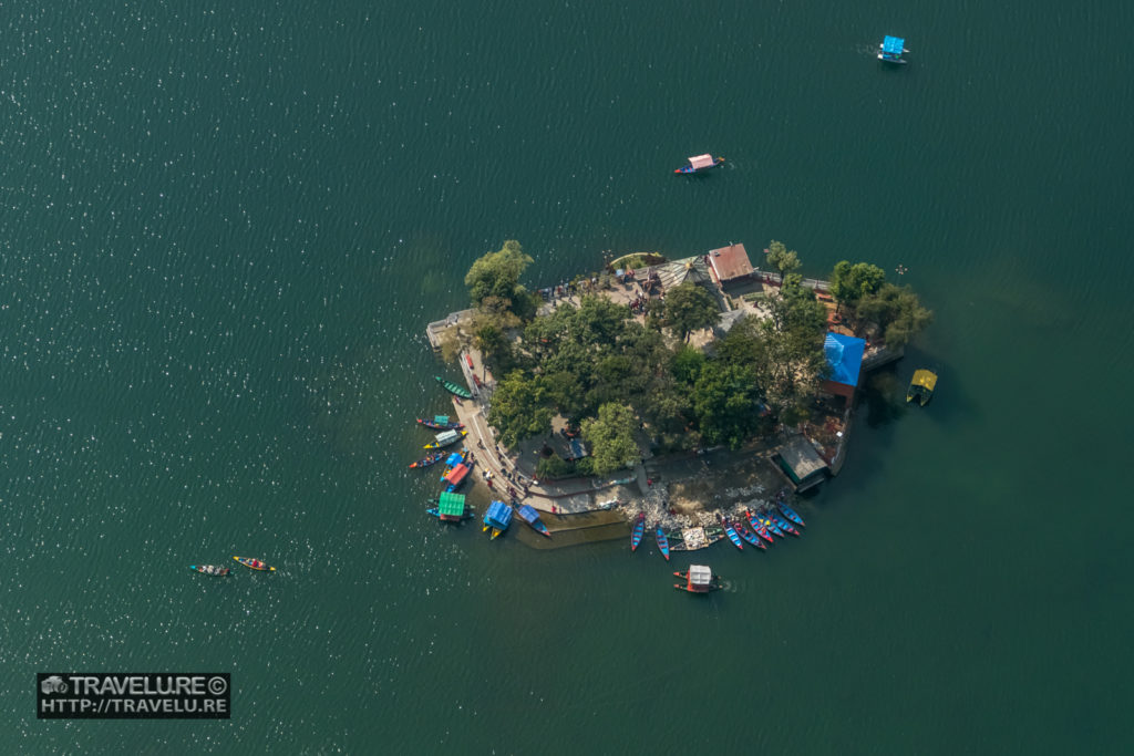 Aerial View of an island in Phewa Lake - shot from an ultralight plane - Travelure ©