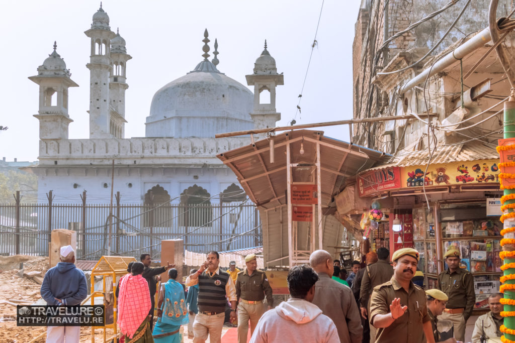 Kashi Vishwanath Temple, the site of one of the twelve jyotirlingas, has a controversial mosque next to it. - Travelure ©