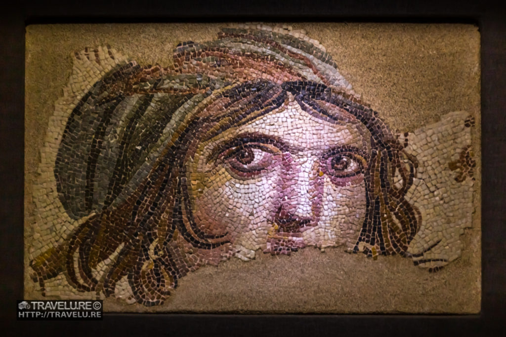 A Zeugma Mosaic on display in Zeugma Mosaic Museum, Gaziantep, that resembles the intensity of Steve McCurry's Gypsy Girl, which appeared on Time Magazine cover - Travelure ©