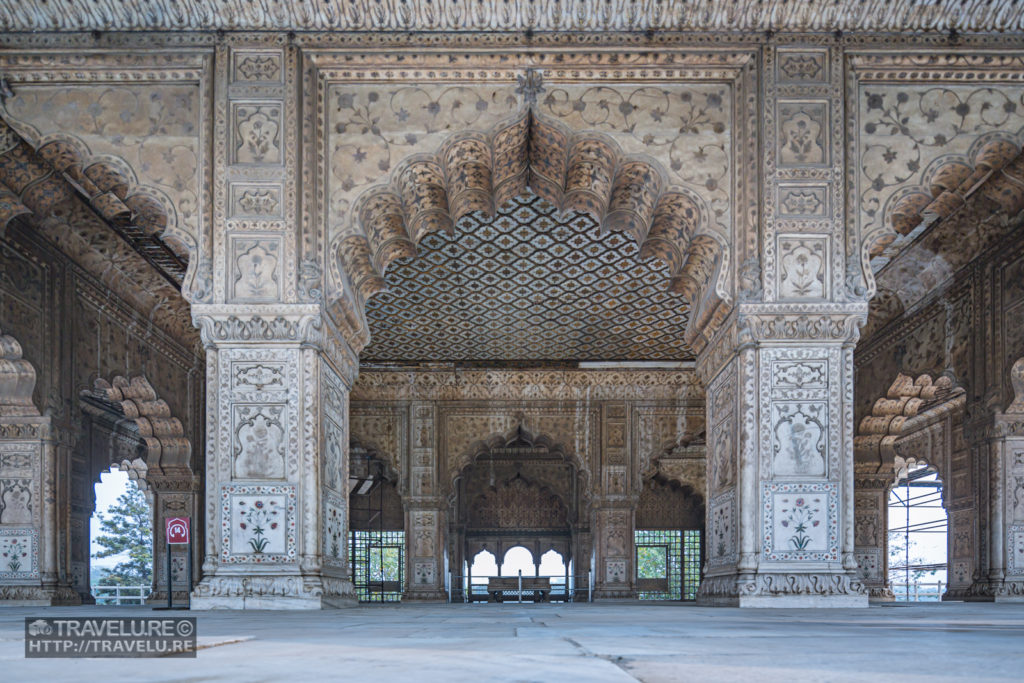 Intricate craftsmanship on marble adorns Diwan-i-Khas. Precious metal and stones have now been plundered and a bare shell remains. - Travelure ©