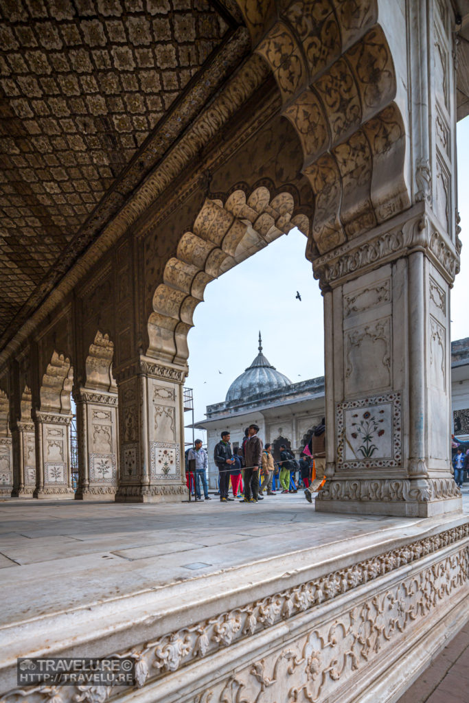 Intricate craftsmanship on marble adorns Diwan-i-Khas. Precious metal and stones have now been plundered and a bare shell remains. - Travelure ©