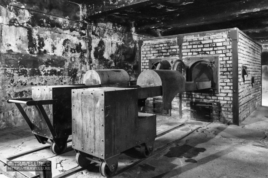 Incinerators and body loading trolleys in a gas chamber at Auschwitz - Travelure ©