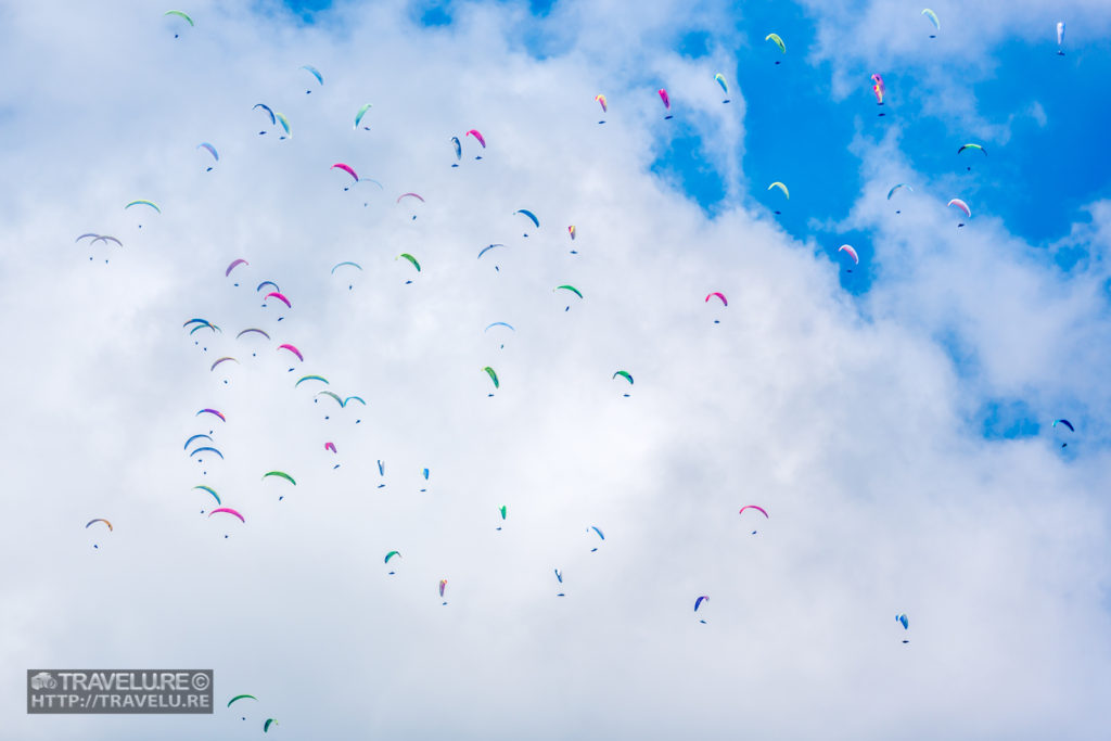 Paragliders fill the sky in Bir, Himachal Pradesh - Cutting the Clutter for a Balanced Frame - Travelure ©