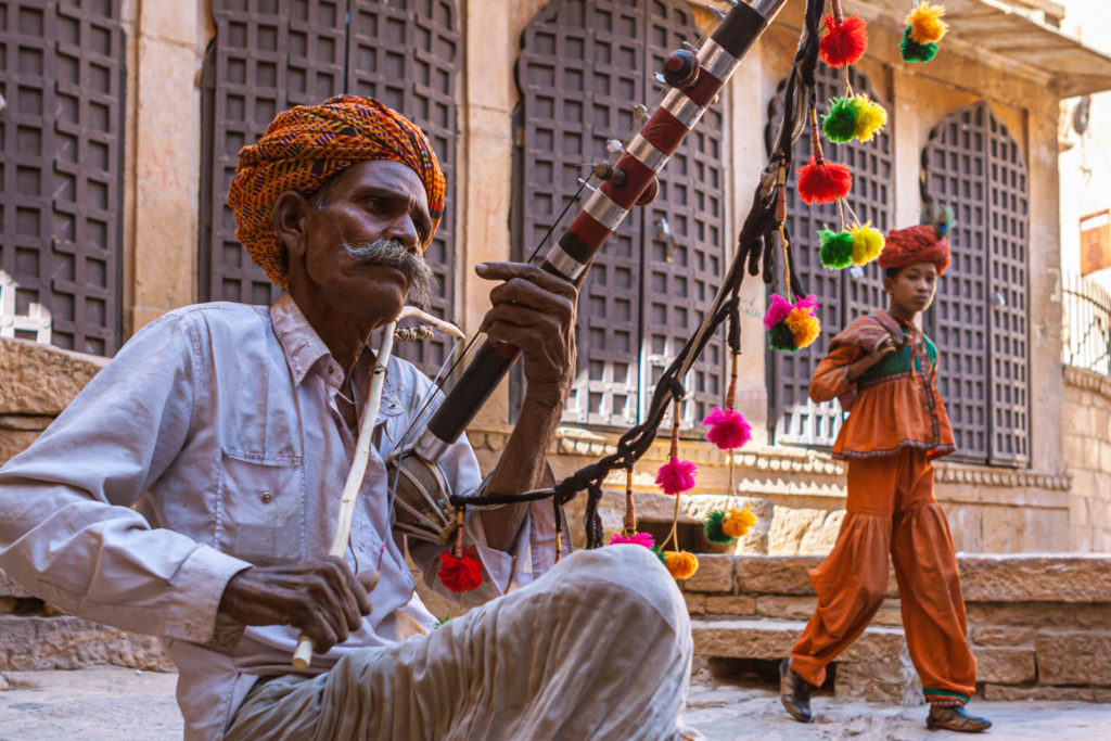 A folk musician performs to earn a living in Jaisalmer Fort - Travelure ©