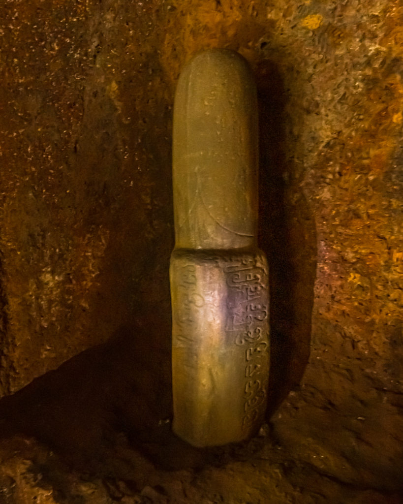 Inscription in Brahmi at the base of the Shiva Linga - Travelure ©