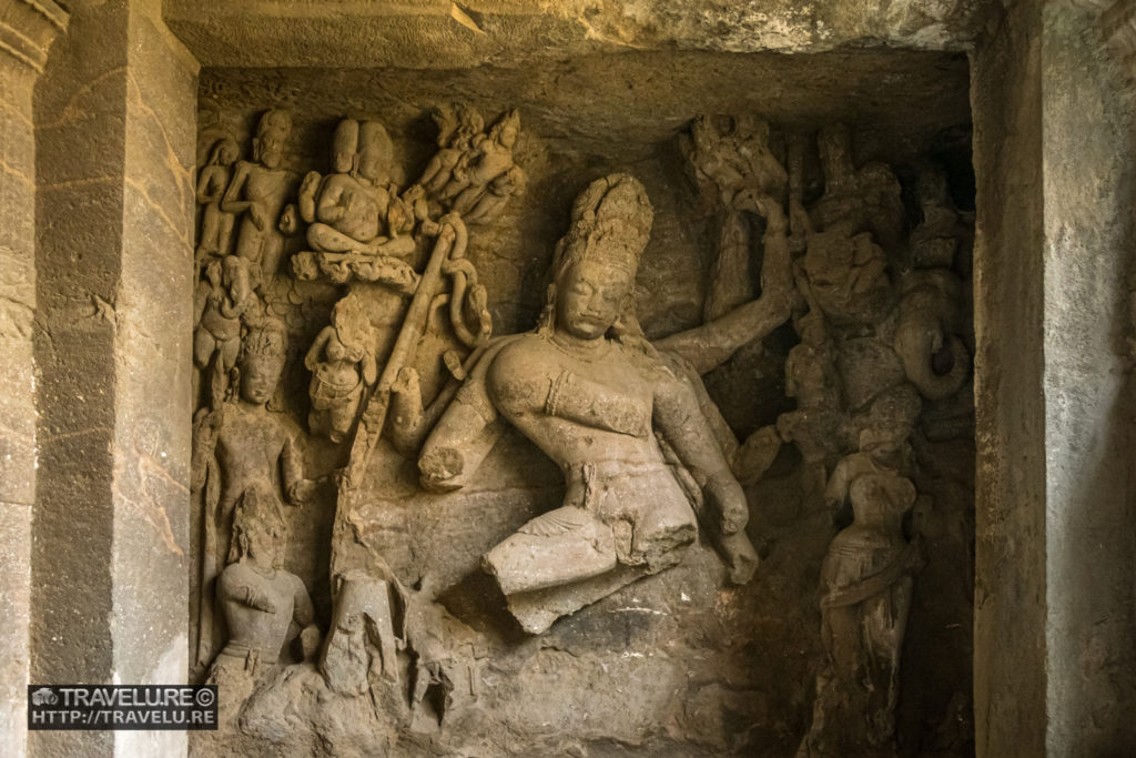 Another bas relief near the entrance of Cave #1 - Travelure ©