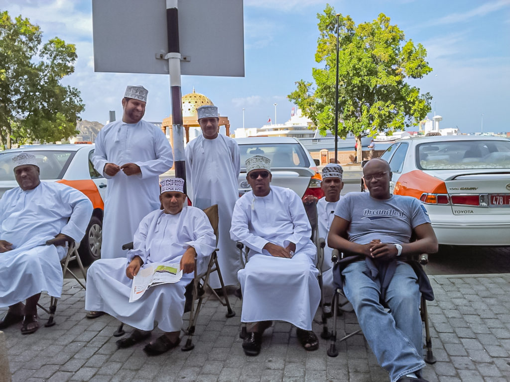 Kerwin with cabbies in Oman - Travelure ©