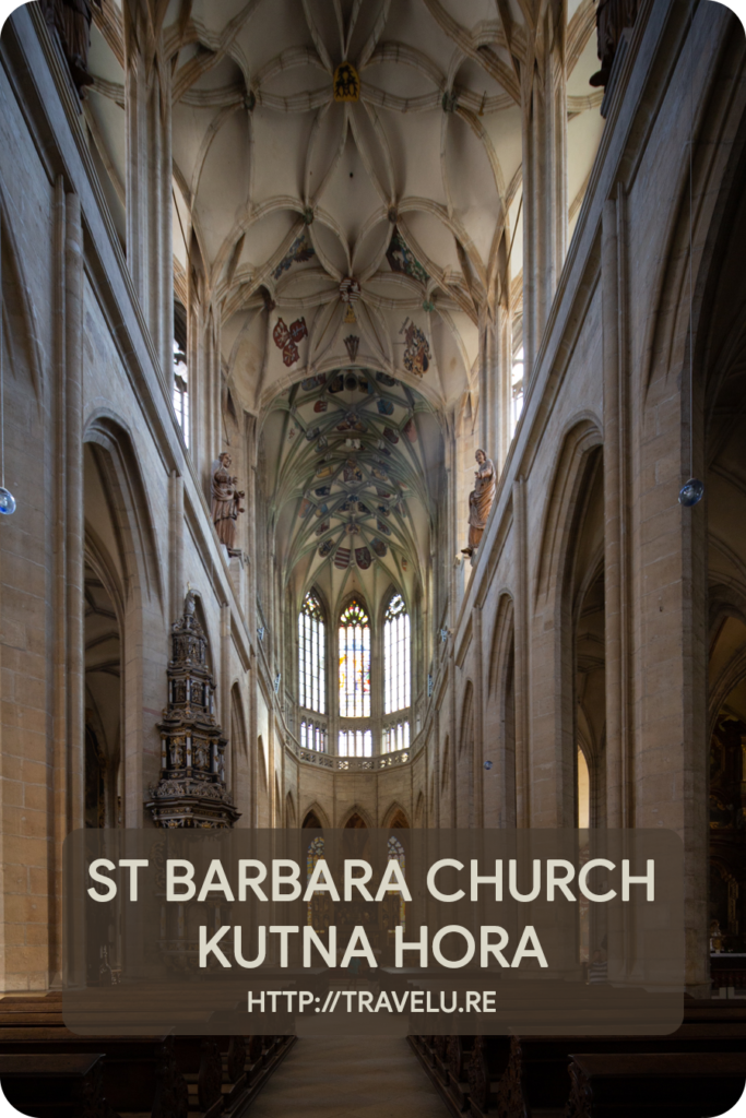 The bright reds, sparkling greens, hues of blues, and rich purples impart the stained glass windows, exquisite vibrance. - St Barbara Church, Kutna Hora - Central Europe’s Architectural Beacon - Travelure ©