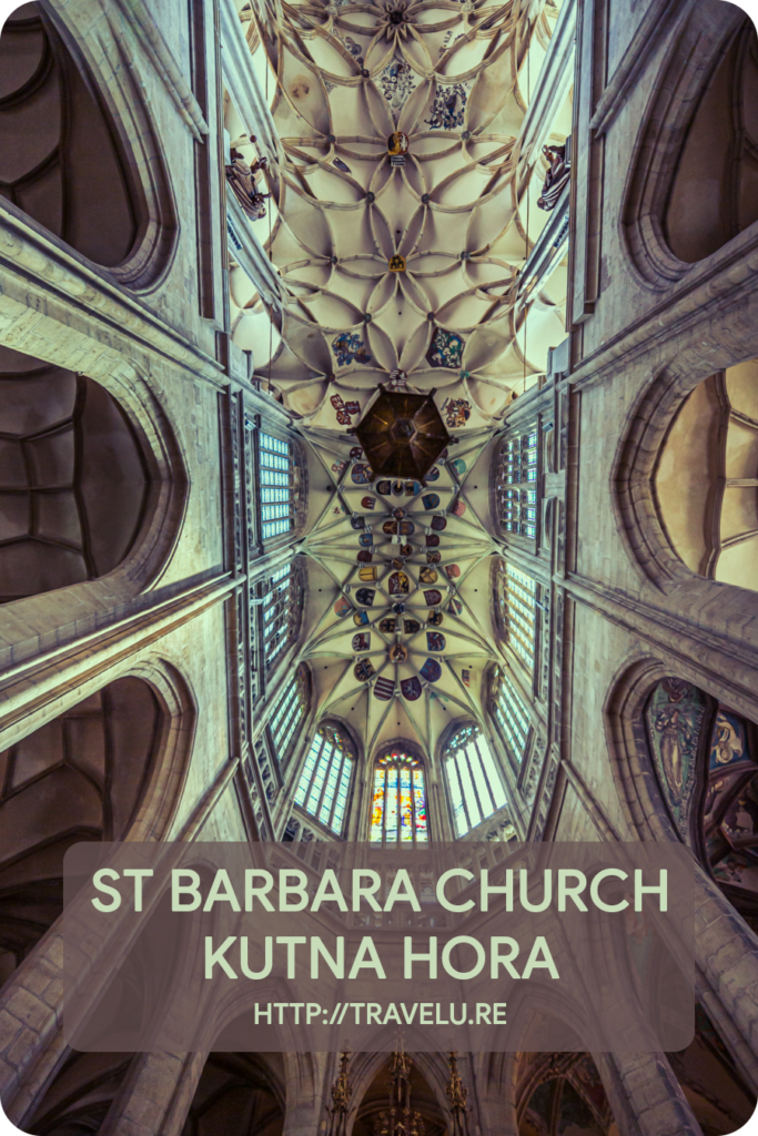 The bright reds, sparkling greens, hues of blues, and rich purples impart the stained glass windows, exquisite vibrance. - St Barbara Church, Kutna Hora - Central Europe’s Architectural Beacon - Travelure ©