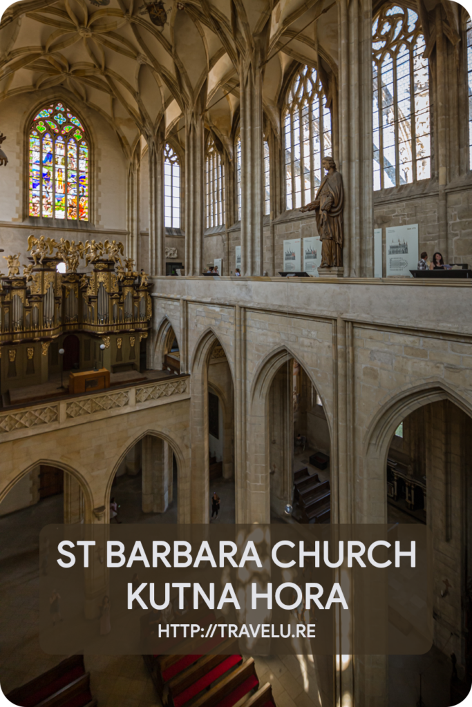 The bright reds, sparkling greens, hues of blues, and rich purples impart the stained glass windows, exquisite vibrance. - St Barbara Church, Kutna Hora - Central Europe’s Architectural Beacon - Travelure ©