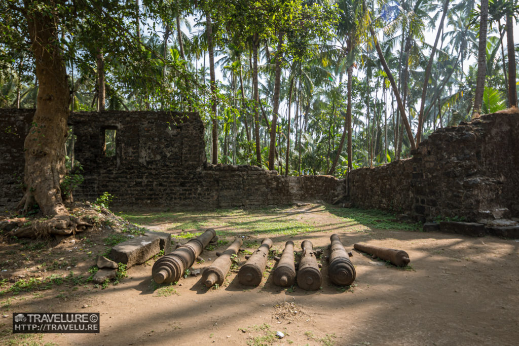 Cannons that used to defend the fort lie haphazardly in the fort's church compound - Travelure ©